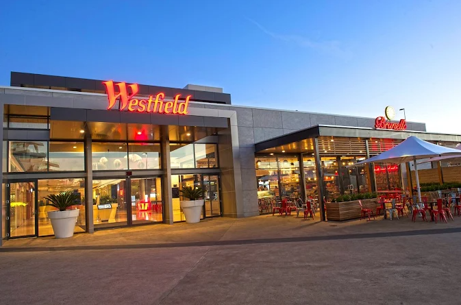 Westfield shopping center exterior with clear blue sky
